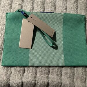 Rothy’s Essential Pouch in Jade with Magnets. (Larger wristlet)